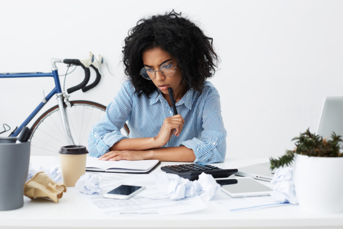 Woman Working on Payroll Process Woman Running Payroll Process
